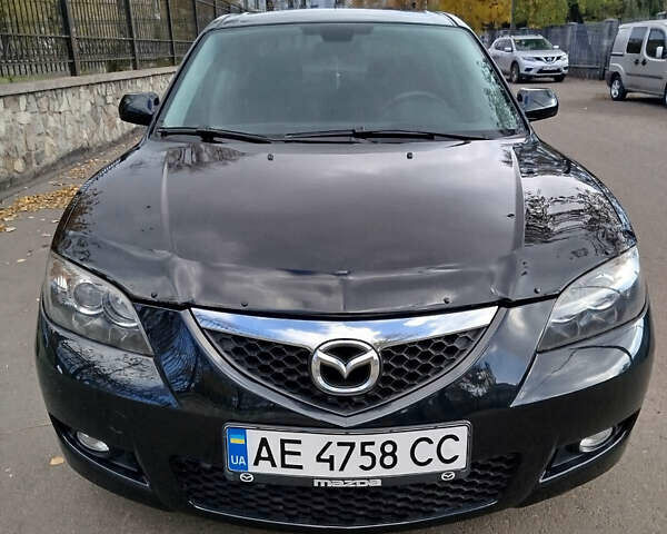 Черный Мазда 3, объемом двигателя 2 л и пробегом 199 тыс. км за 6800 $, фото 6 на Automoto.ua