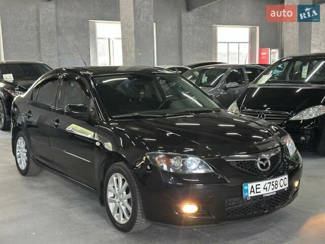 Чорний Мазда 3, об'ємом двигуна 2 л та пробігом 199 тис. км за 7299 $, фото 9 на Automoto.ua