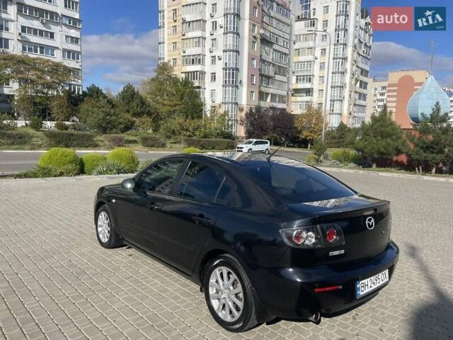 Черный Мазда 3, объемом двигателя 2 л и пробегом 175 тыс. км за 6000 $, фото 4 на Automoto.ua