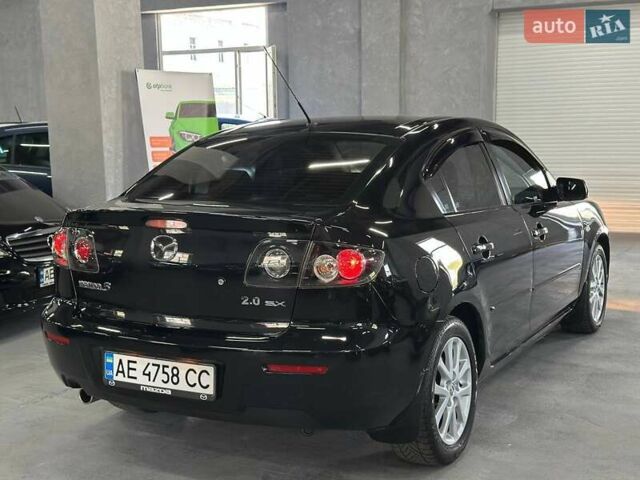Чорний Мазда 3, об'ємом двигуна 2 л та пробігом 199 тис. км за 7299 $, фото 6 на Automoto.ua
