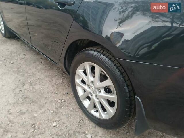 Черный Мазда 3, объемом двигателя 2 л и пробегом 221 тыс. км за 5700 $, фото 13 на Automoto.ua