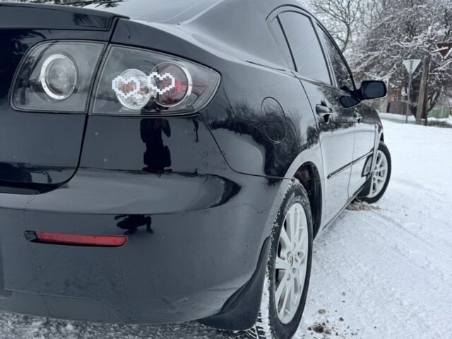 Чорний Мазда 3, об'ємом двигуна 1.6 л та пробігом 328 тис. км за 5700 $, фото 6 на Automoto.ua
