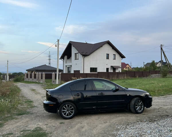 Черный Мазда 3, объемом двигателя 1.6 л и пробегом 190 тыс. км за 5500 $, фото 6 на Automoto.ua