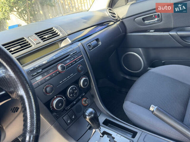 Чорний Мазда 3, об'ємом двигуна 1.6 л та пробігом 160 тис. км за 5999 $, фото 13 на Automoto.ua