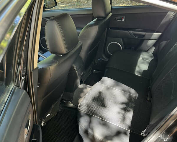 Чорний Мазда 3, об'ємом двигуна 1.6 л та пробігом 147 тис. км за 5500 $, фото 3 на Automoto.ua