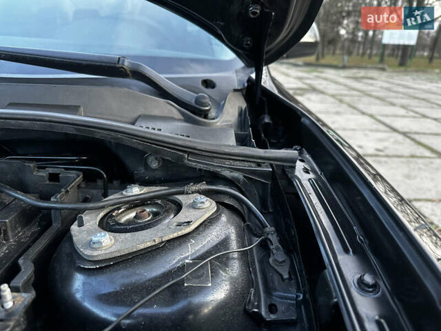 Чорний Мазда 3, об'ємом двигуна 1.6 л та пробігом 198 тис. км за 5499 $, фото 50 на Automoto.ua