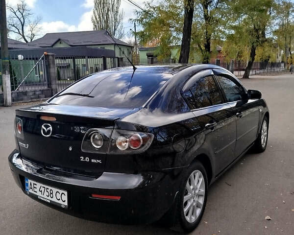 Черный Мазда 3, объемом двигателя 2 л и пробегом 199 тыс. км за 6800 $, фото 5 на Automoto.ua