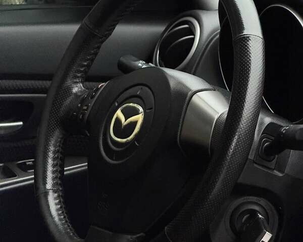 Черный Мазда 3, объемом двигателя 1.6 л и пробегом 89 тыс. км за 4800 $, фото 12 на Automoto.ua