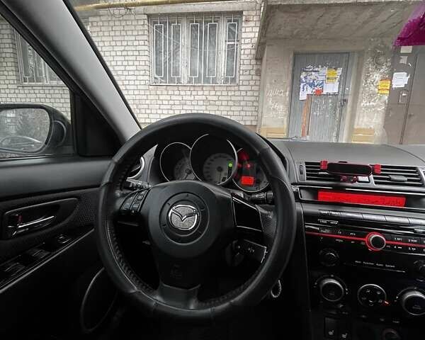 Черный Мазда 3, объемом двигателя 1.6 л и пробегом 153 тыс. км за 6200 $, фото 13 на Automoto.ua