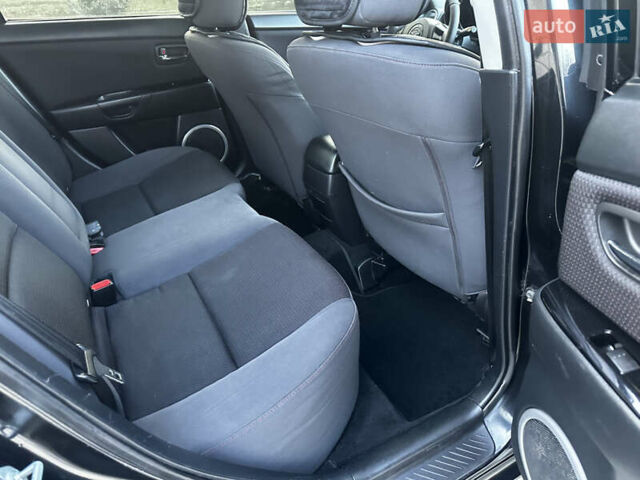 Чорний Мазда 3, об'ємом двигуна 1.6 л та пробігом 198 тис. км за 5499 $, фото 34 на Automoto.ua