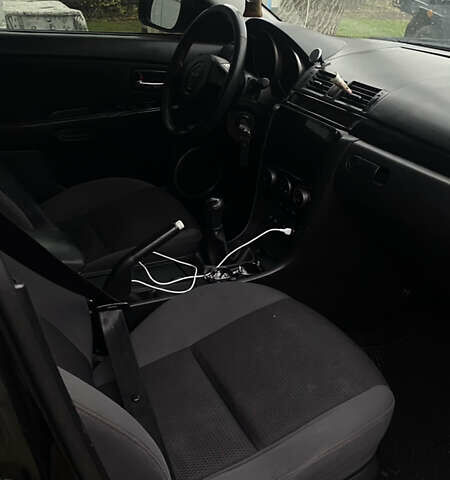 Черный Мазда 3, объемом двигателя 2 л и пробегом 182 тыс. км за 5500 $, фото 18 на Automoto.ua