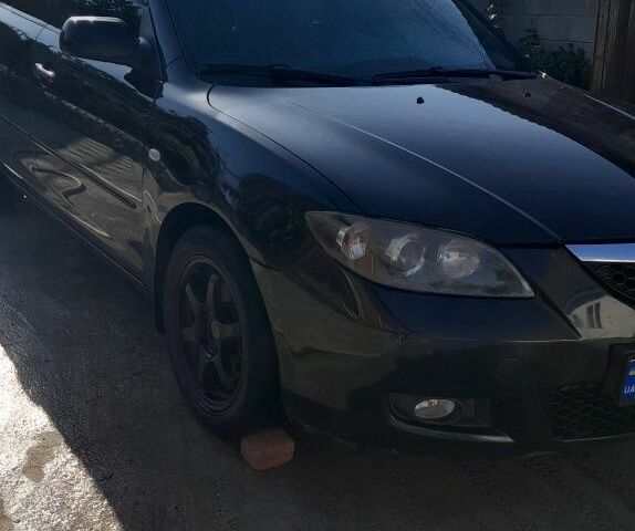 Черный Мазда 3, объемом двигателя 1.6 л и пробегом 2 тыс. км за 5400 $, фото 7 на Automoto.ua