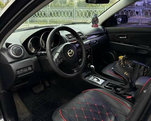 Черный Мазда 3, объемом двигателя 1.6 л и пробегом 253 тыс. км за 5400 $, фото 3 на Automoto.ua