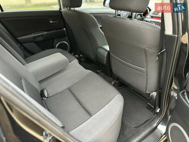 Черный Мазда 3, объемом двигателя 1.6 л и пробегом 130 тыс. км за 7700 $, фото 48 на Automoto.ua