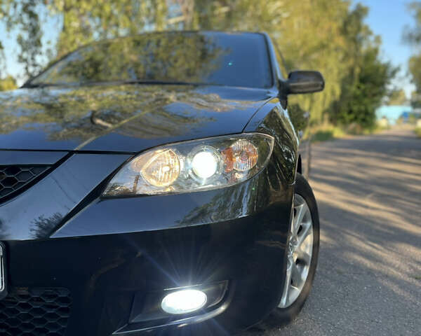 Чорний Мазда 3, об'ємом двигуна 2 л та пробігом 220 тис. км за 5500 $, фото 7 на Automoto.ua