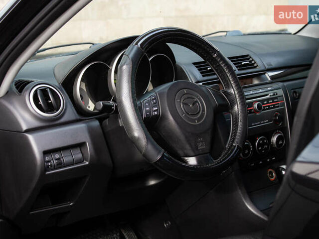 Черный Мазда 3, объемом двигателя 1.6 л и пробегом 185 тыс. км за 6350 $, фото 10 на Automoto.ua