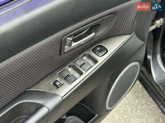 Чорний Мазда 3, об'ємом двигуна 1.6 л та пробігом 223 тис. км за 5450 $, фото 22 на Automoto.ua
