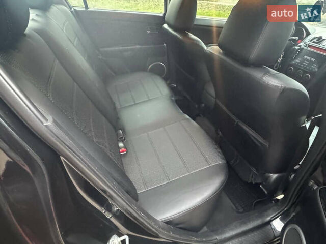 Чорний Мазда 3, об'ємом двигуна 1.6 л та пробігом 154 тис. км за 4550 $, фото 7 на Automoto.ua