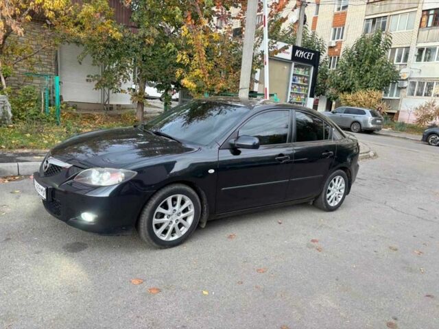 Черный Мазда 3, объемом двигателя 1.6 л и пробегом 185 тыс. км за 7750 $, фото 1 на Automoto.ua