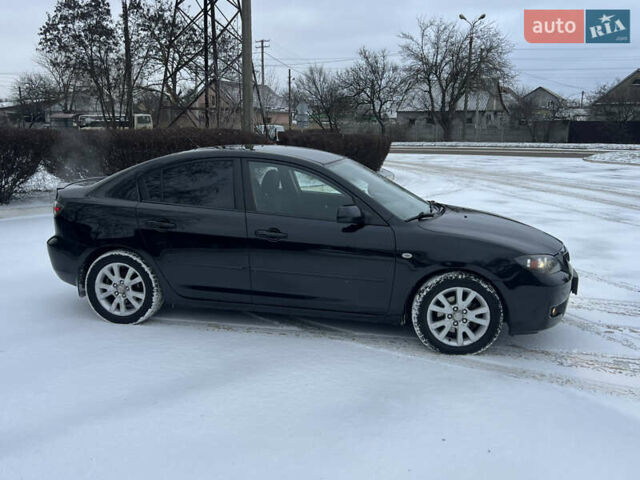 Чорний Мазда 3, об'ємом двигуна 1.6 л та пробігом 196 тис. км за 5500 $, фото 4 на Automoto.ua