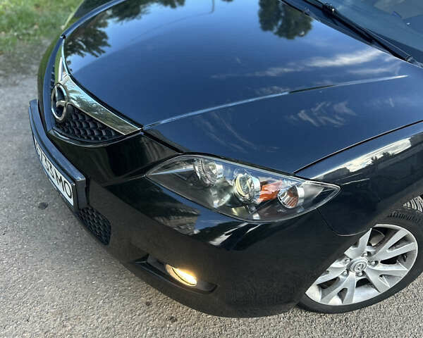 Черный Мазда 3, объемом двигателя 1.6 л и пробегом 153 тыс. км за 5500 $, фото 4 на Automoto.ua