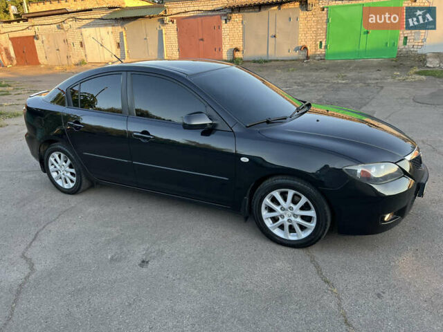 Чорний Мазда 3, об'ємом двигуна 2 л та пробігом 167 тис. км за 7500 $, фото 5 на Automoto.ua