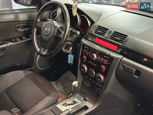 Чорний Мазда 3, об'ємом двигуна 2 л та пробігом 199 тис. км за 7299 $, фото 17 на Automoto.ua