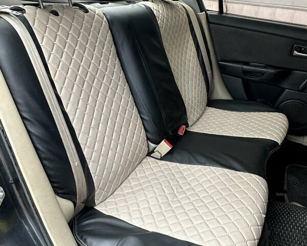 Черный Мазда 3, объемом двигателя 2 л и пробегом 200 тыс. км за 2700 $, фото 15 на Automoto.ua