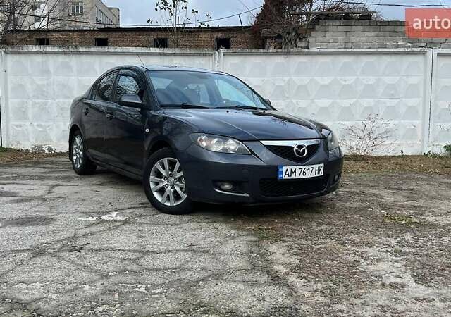 Черный Мазда 3, объемом двигателя 1.6 л и пробегом 211 тыс. км за 5950 $, фото 1 на Automoto.ua