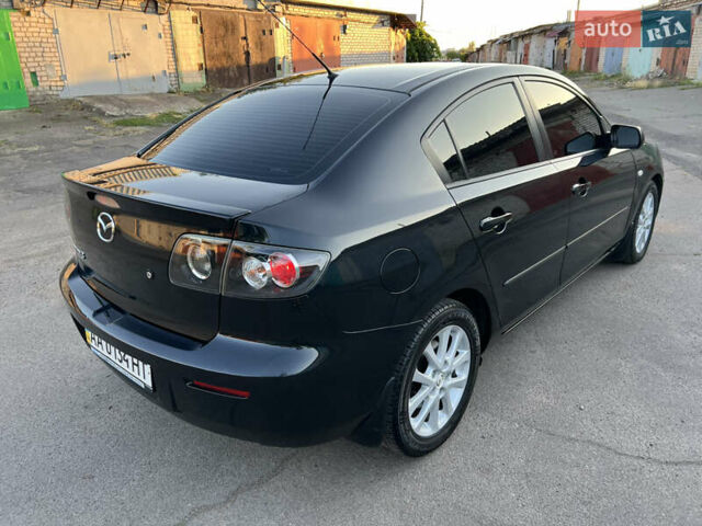 Чорний Мазда 3, об'ємом двигуна 2 л та пробігом 167 тис. км за 7500 $, фото 4 на Automoto.ua