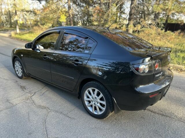 Черный Мазда 3, объемом двигателя 2 л и пробегом 192 тыс. км за 6500 $, фото 7 на Automoto.ua