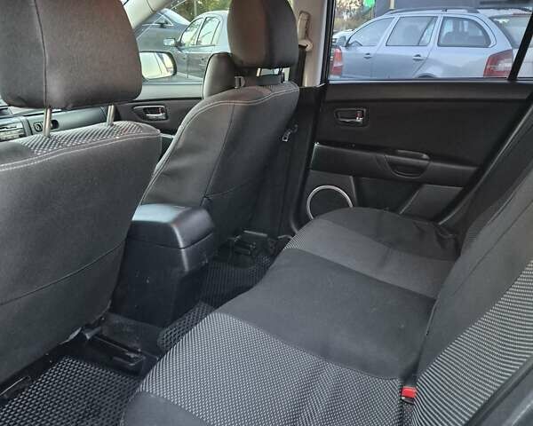 Чорний Мазда 3, об'ємом двигуна 1.6 л та пробігом 253 тис. км за 5200 $, фото 28 на Automoto.ua