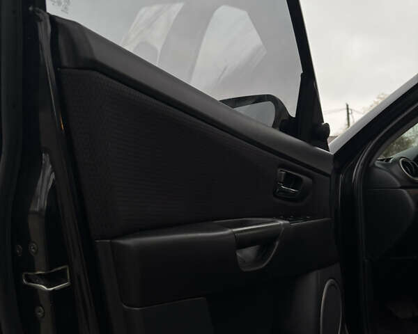 Чорний Мазда 3, об'ємом двигуна 1.6 л та пробігом 330 тис. км за 5500 $, фото 11 на Automoto.ua