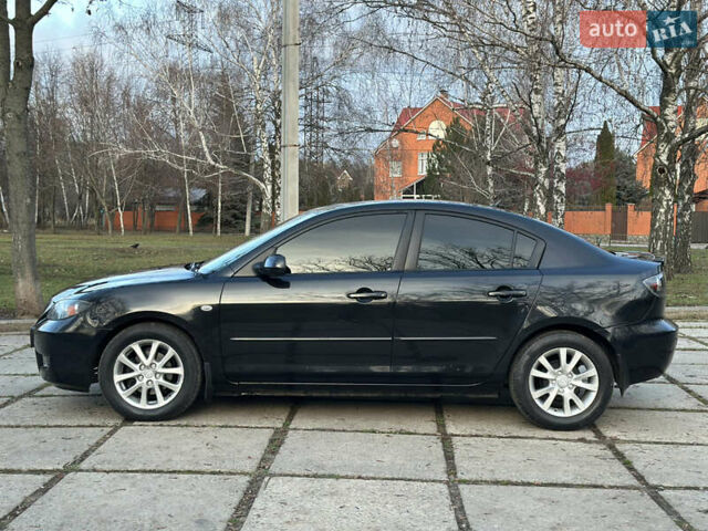 Чорний Мазда 3, об'ємом двигуна 1.6 л та пробігом 198 тис. км за 5499 $, фото 13 на Automoto.ua