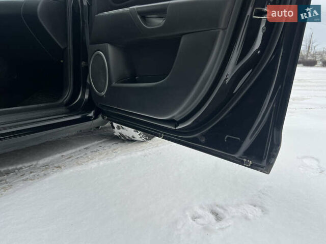 Чорний Мазда 3, об'ємом двигуна 1.6 л та пробігом 196 тис. км за 5500 $, фото 16 на Automoto.ua