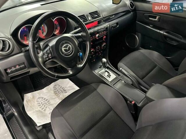 Чорний Мазда 3, об'ємом двигуна 2 л та пробігом 199 тис. км за 7299 $, фото 11 на Automoto.ua