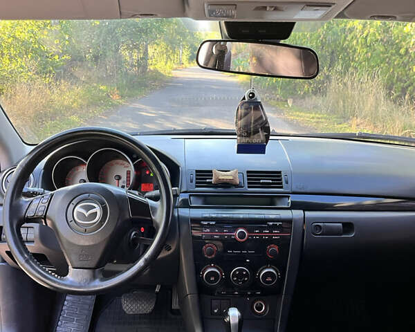 Чорний Мазда 3, об'ємом двигуна 2 л та пробігом 220 тис. км за 5500 $, фото 20 на Automoto.ua