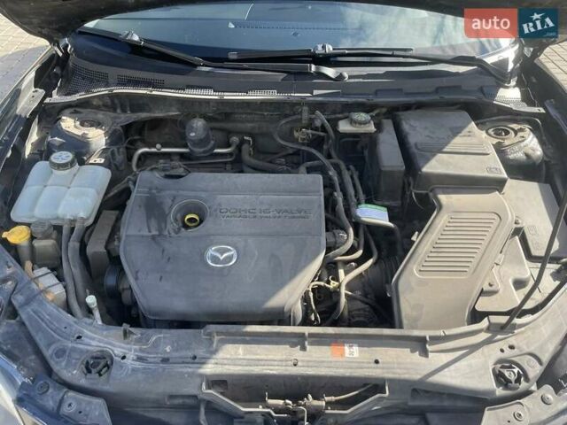 Черный Мазда 3, объемом двигателя 2 л и пробегом 175 тыс. км за 6000 $, фото 17 на Automoto.ua