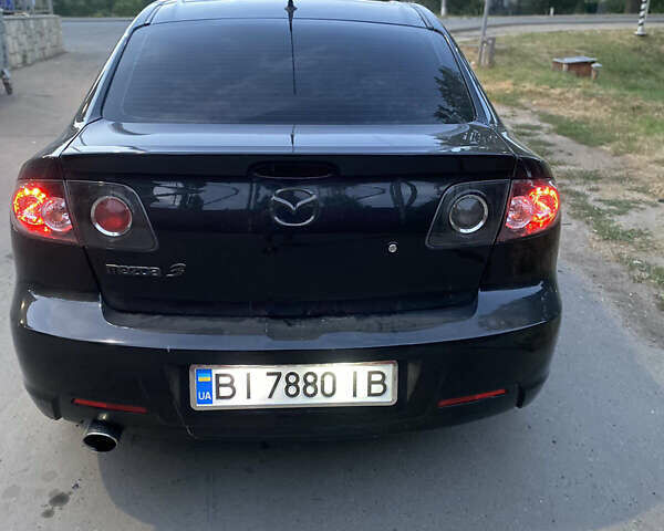 Черный Мазда 3, объемом двигателя 2 л и пробегом 204 тыс. км за 6700 $, фото 4 на Automoto.ua