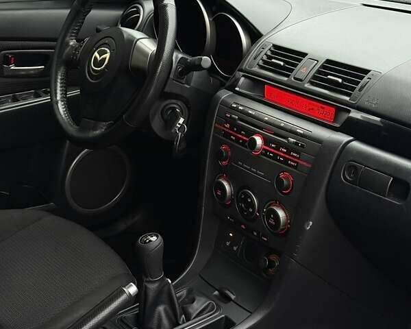 Черный Мазда 3, объемом двигателя 1.6 л и пробегом 89 тыс. км за 4800 $, фото 9 на Automoto.ua