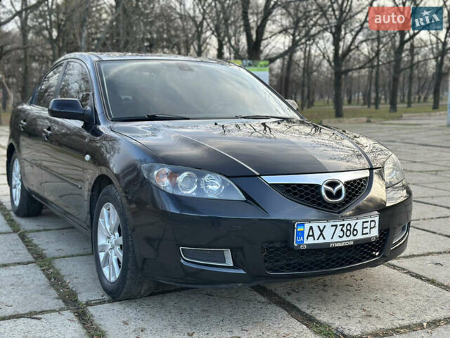 Чорний Мазда 3, об'ємом двигуна 1.6 л та пробігом 198 тис. км за 5499 $, фото 8 на Automoto.ua
