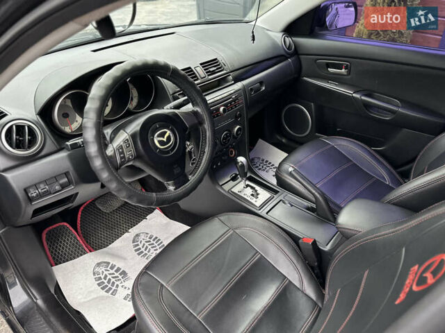 Чорний Мазда 3, об'ємом двигуна 1.6 л та пробігом 223 тис. км за 5450 $, фото 27 на Automoto.ua