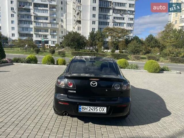 Черный Мазда 3, объемом двигателя 2 л и пробегом 175 тыс. км за 6000 $, фото 5 на Automoto.ua
