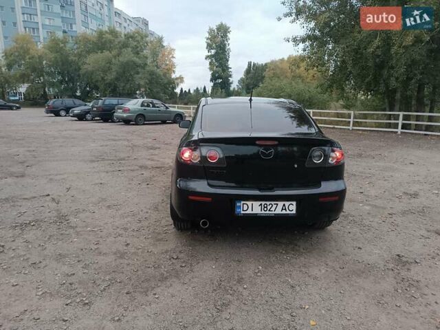 Черный Мазда 3, объемом двигателя 2 л и пробегом 221 тыс. км за 5700 $, фото 6 на Automoto.ua