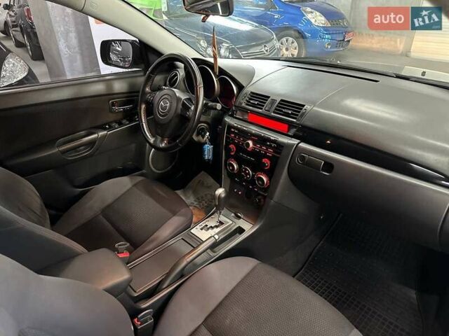 Чорний Мазда 3, об'ємом двигуна 2 л та пробігом 199 тис. км за 7299 $, фото 15 на Automoto.ua