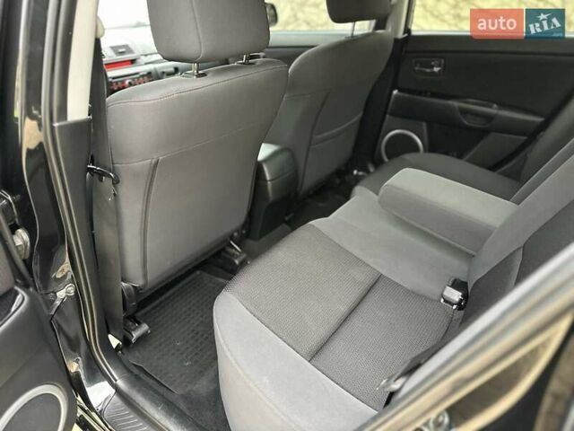 Черный Мазда 3, объемом двигателя 1.6 л и пробегом 130 тыс. км за 7700 $, фото 46 на Automoto.ua