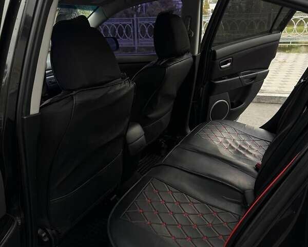 Черный Мазда 3, объемом двигателя 1.6 л и пробегом 253 тыс. км за 5400 $, фото 1 на Automoto.ua