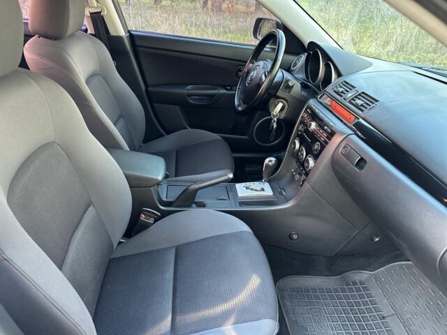 Черный Мазда 3, объемом двигателя 2 л и пробегом 192 тыс. км за 6500 $, фото 3 на Automoto.ua