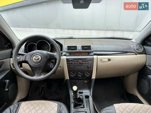 Черный Мазда 3, объемом двигателя 2 л и пробегом 200 тыс. км за 2700 $, фото 19 на Automoto.ua