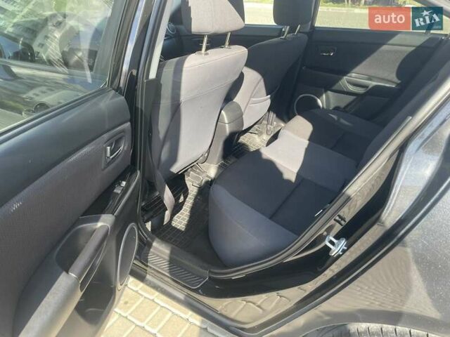 Черный Мазда 3, объемом двигателя 2 л и пробегом 175 тыс. км за 6000 $, фото 10 на Automoto.ua